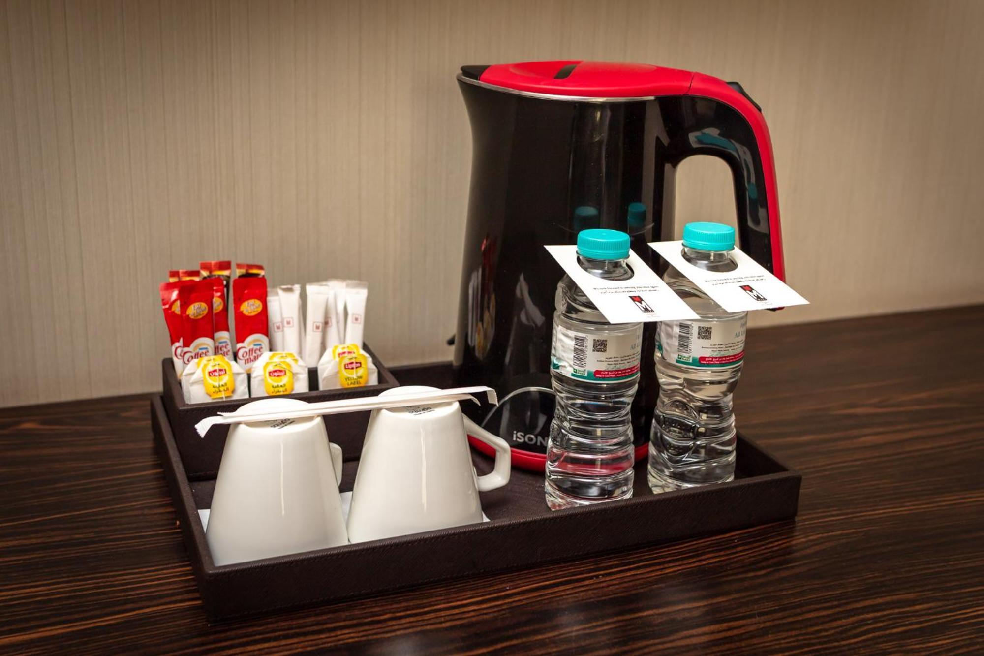 M Hotel Makkah By Millennium Mekka Exteriör bild A tray of room service